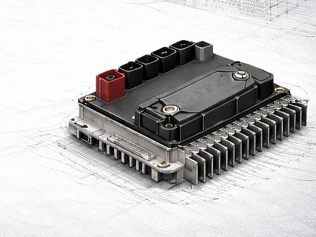 Steuergerät für die Elektroindustrie vor einer Konzeptzeichnung