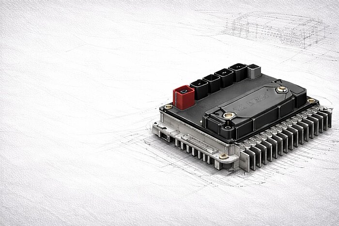 Steuergerät für die Elektroindustrie vor einer Konzeptzeichnung